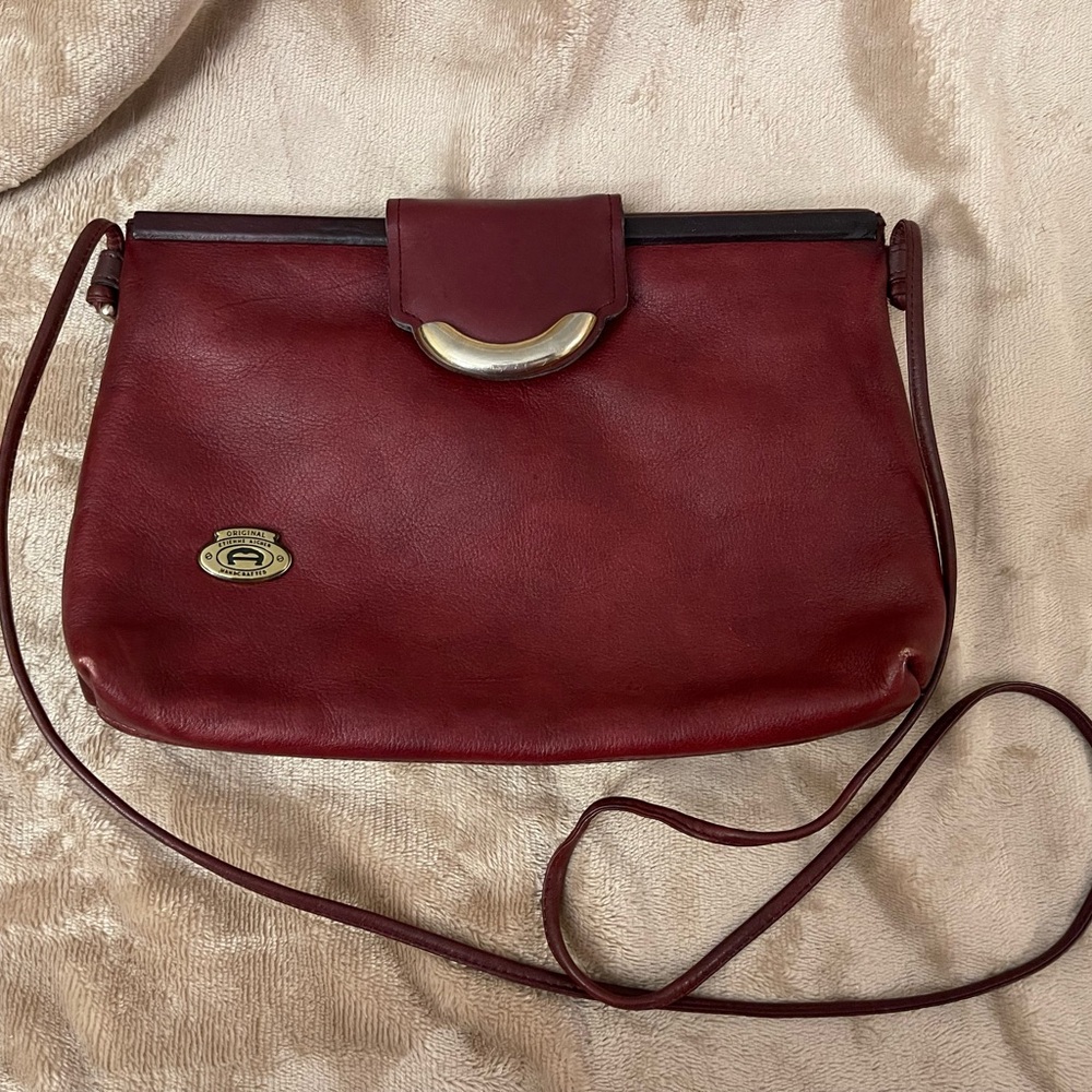 Vintage Étienne Aigner deep red cross body bag. Good condition!